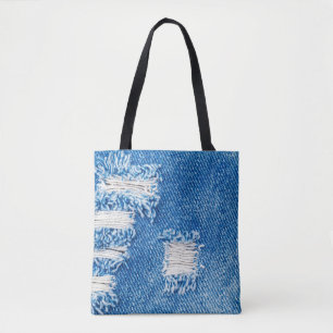 Hole on Denim Jeans. Ripped Destroyed Torn Blue je Tote Bag
