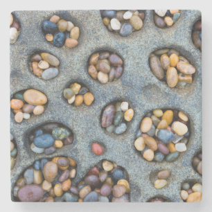 Holes filled with pebbles, CA Stone Coaster