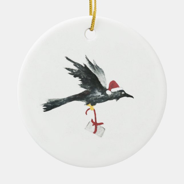 Holiday raven carrying a present ceramic ornament (Front)