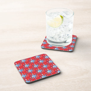 Holiday red and blue snowflakes and stars coaster