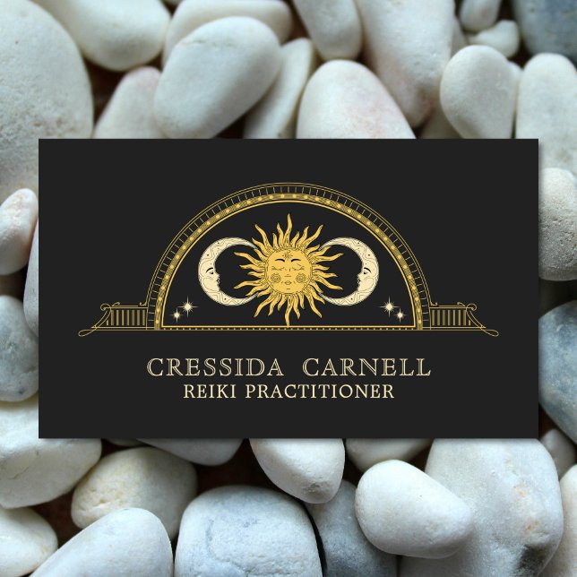 Holistic Celestial Sun & Moon Mystical Cosmic Business Card (Celestial sun and moon Reiki Practitioner business card. Shown with a white pebble background.)