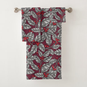 Holly berry, gray leaves on dark red