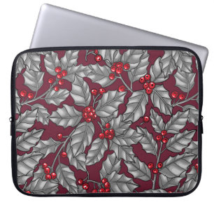 Holly berry, grey leaves on dark red laptop sleeve