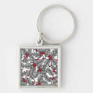 Holly berry, grey leaves on white keychain