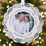 Holly Berry Wreath First Christmas Wedding Photo Ornament Card<br><div class="desc">Send festive holiday greetings to your friends and family with a special Christmas keepsake celebrating your first Christmas as a married couple. The paper ornament card features your favourite wedding photo encircled by a wreath of holly berries, green eucalyptus, and white flowers. The design displays the phrase "Our First Christmas...</div>