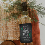 Holly Jolly | Custom Christmas Wine Label<br><div class="desc">Customize these festive holiday wine labels with two lines of custom text to create a perfect hostess gift or personalized touch to your Christmas dinner spread. Rustic chalkboard labels feature "have a holly jolly Christmas" in white hand lettered script accented with red and green holly berries and leaves.</div>