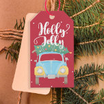 Holly Jolly vintage car colourful Christmas Gift Tags<br><div class="desc">Add a funny seasonal personalized tag to your Christmas gifts! This colourful gift tag features a fun cute vintage carrying a trimmed Christmas tree and "Holly Jolly" typography brushed hand lettering script. To and from lines on the backside.</div>