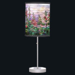 Hollyhocks Vintage Floral Tiffany Stained Glass Table Lamp<br><div class="desc">Gorgeous vintage Art Nouveau Tiffany Stained Glass Floral Window Reproduction depicted the beauty of a field of hollyhocks in romantic purple tone against sunset sky is on this table lamp / tripod lamp / lamp shade / pendant lamp.</div>