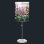 Hollyhocks Vintage Floral Tiffany Stained Glass Table Lamp<br><div class="desc">Gorgeous vintage Art Nouveau Tiffany Stained Glass Floral Window Reproduction depicted the beauty of a field of hollyhocks in romantic purple tone against sunset sky is on this table lamp / tripod lamp / lamp shade / pendant lamp.</div>