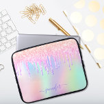 Holographic unicorn glitter rainbow monogram glam laptop sleeve<br><div class="desc">A trendy holographic background with unicorn and rainbow pastel colours in pink, purple, rose gold, mint green. Decorated with faux glitter drips in rose gold, pink and purple. Personalize and add a name, written with a modern hand lettered style script with swashes. Purple coloured letters. To keep the swashes only...</div>