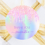 Holograpic unicorn glitter drip thank you birthday classic round sticker<br><div class="desc">A trendy holographic background with unicorn colors and rainbow colors in pink, purple, rose gold, mint green. Decorated with faux glitter drips in rose gold, pink and purple. The text: Thank You. Personalize and add your name, written with a modern hand lettered style script with swashes. Purple letters. o keep...</div>