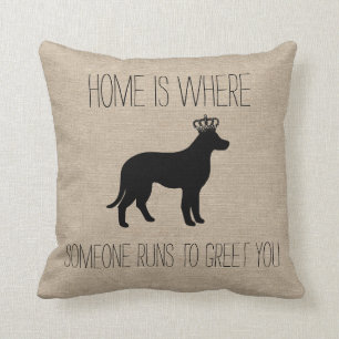 Home is where someone runs to greet you dog throw pillow
