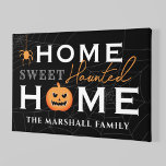 Home Sweet Haunted Home Personalized Halloween Canvas Print<br><div class="desc">Welcome your guests with this spooky fun personalized Halloween canvas wall art. The stylish typography design features "Home Sweet Haunted Home" wording with custom text for your family name and accents of a scary jack-o-lantern pumpkin, creepy dangling spider, and spider web background. Includes a black, grey, white, and orange colour...</div>