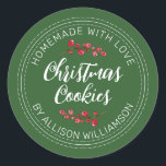 Homemade Christmas Cranberry Cookies Green Classic Round Sticker<br><div class="desc">Rustic and modern homemade baked goods sticker with the text homemade with love, christmas cookies and your name in off-black handwritten script calligraphy and modern typography on a green background with a stylish touch of cranberries sprigs. Simply add your name and the product name to the label. Exclusively designed for...</div>