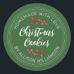 Homemade Christmas Cranberry Cookies Green Classic Round Sticker<br><div class="desc">Rustic and modern homemade baked goods sticker with the text homemade with love, christmas cookies and your name in off-black handwritten script calligraphy and modern typography on a green background with a stylish touch of cranberries sprigs. Simply add your name and the product name to the label. Exclusively designed for...</div>