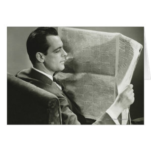 Homme d'affaires lisant le journal
