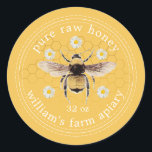 Honey Jar Label Honeybee Apiary Yellow<br><div class="desc">Rustic and simple honey jar labels with a vintage honeybee print and the text pure raw honey and your business name in modern typography on a honey yellow background, with a lovely touch of white floral daisies and gold honeycomb pattern. Simply add your apiary name, the product name and the...</div>