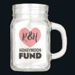 Honeymoon fund mason jar for newlyweds<br><div class="desc">Honeymoon fund mason jar for newlyweds. Collect money and funds in this jar glass jar. Handy finance pot for saving coins and paper bills. Also great for saving money for expensive trips, vacations, cars, gadgets and more. Personalize with your own name initials of bride and groom. Pink heart logo with...</div>