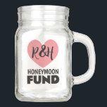 Honeymoon fund mason jar for newlyweds<br><div class="desc">Honeymoon fund mason jar for newlyweds. Collect money and funds in this jar glass jar. Handy finance pot for saving coins and paper bills. Also great for saving money for expensive trips, vacations, cars, gadgets and more. Personalize with your own name initials of bride and groom. Pink heart logo with...</div>