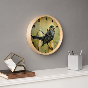 Horloge à ailes rouges