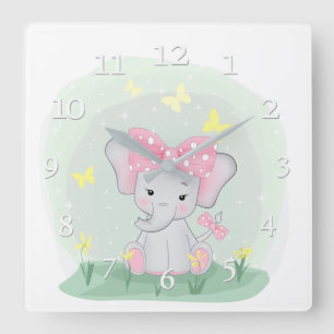 Horloge Carrée  Beau éléphant avec un arc rose dans une clairière