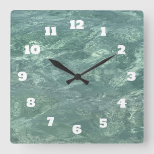 Horloge Carrée Bleu étincelant Eau verte Abstraite Plage Côte