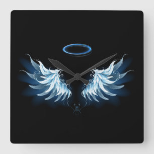 Horloge Carrée Blue Glowing Angel Wings on black background