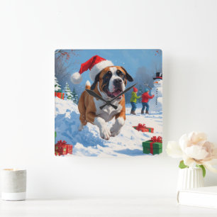 Horloge Carrée Cane Corso courant dans la neige avec un chapeau d