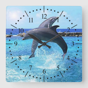 Horloge Carrée Dauphins dansant dans l'océan