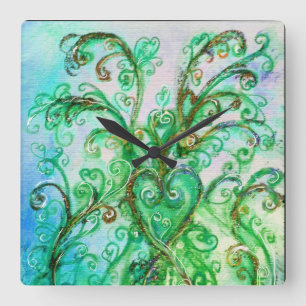 HORLOGE CARRÉE FLEURS BLEUES VERTES ET BLANCHES DE COEUR