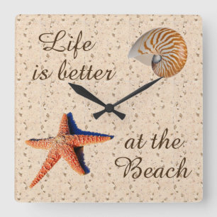 Horloge Carrée La vie est meilleure à l'horloge murale de plage