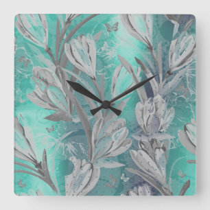 Horloge Carrée Papillon floral turquoise aquatique de graphite