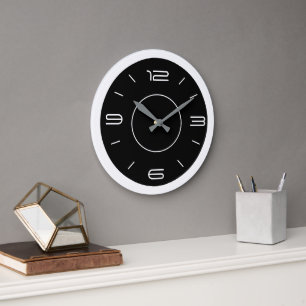 Horloge de cuisine noire et blanche dans l'atmosph