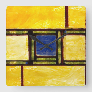 Horloge de la fenêtre en verre jaune et bleu
