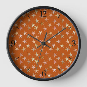 Horloge Étoiles métalliques, tons or pâle et cuivre