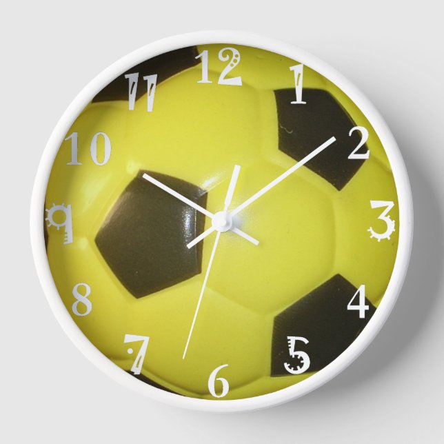 Horloge Le football du dos et du jaune. (Recto)