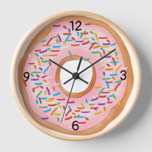 Horloge Le givrage rose de beignet arrose le beignet