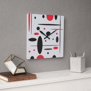 Horloge murale abstraite de noir, rouge et de