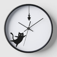 Horloge murale chat noir attrape un poisson