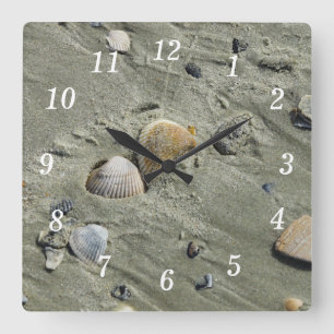 Horloge murale coquillages et sable