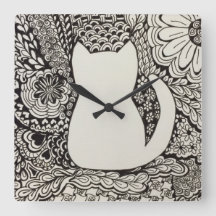 Horloge murale de griffonnage de chat