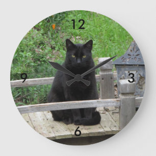 Horloge murale de pont de chat noir