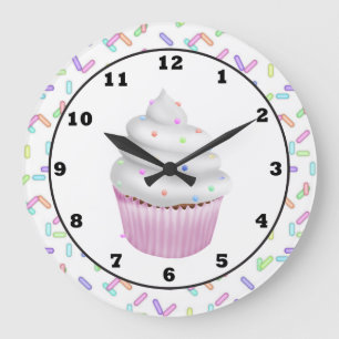 Horloge murale douce arrosée de petit gâteau de