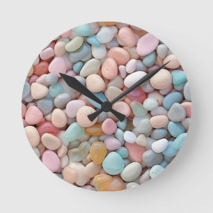 Horloge murale en galets pastel