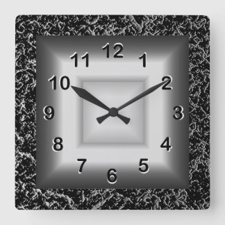 Horloge murale gris aspect métal noir argent