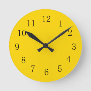 Horloge murale jaune d'or profond