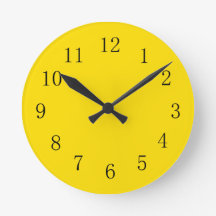 Horloge murale jaune doré brillant