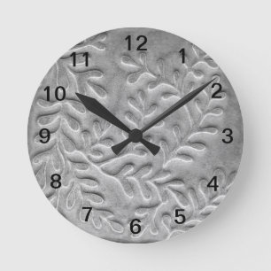 Horloge murale minimaliste en feuilles grises