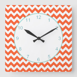 Horloge murale orange élégante de Chevron
