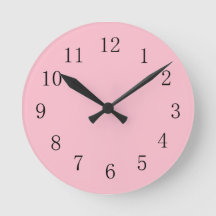 Horloge murale rose pâle